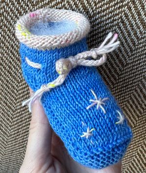 Knit blue baby boot with star detail